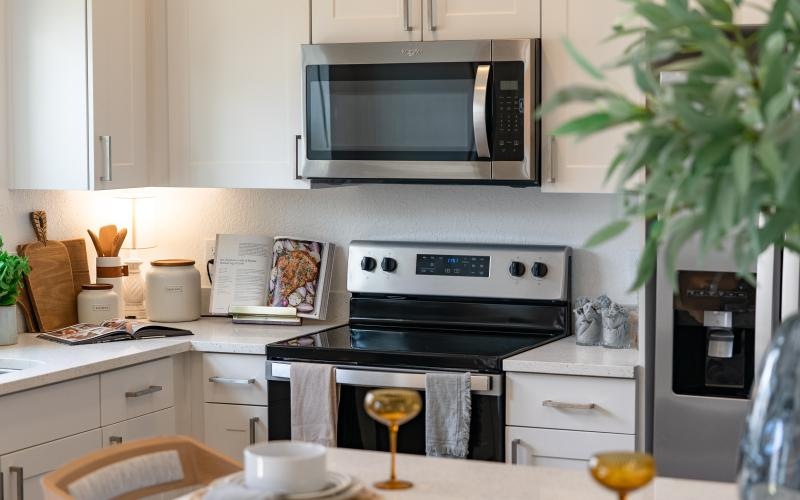 a kitchen with a microwave oven and stove