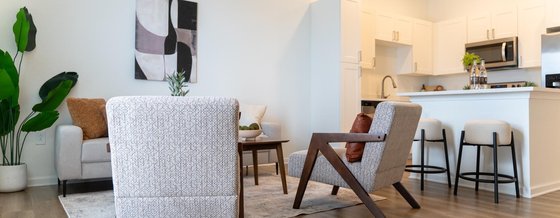 a kitchen with a dining table and chairs